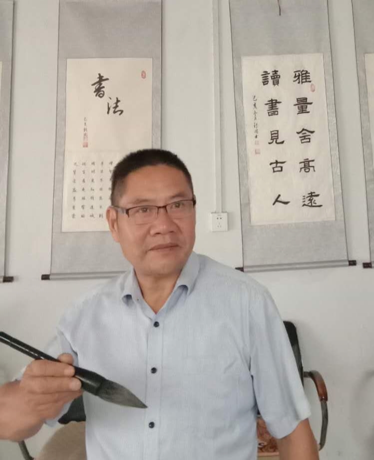王新周